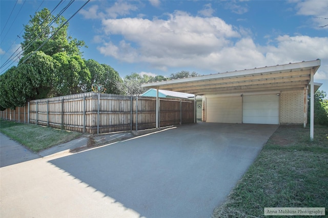 exterior space with a carport