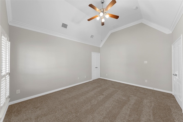 unfurnished room featuring lofted ceiling, ornamental molding, ceiling fan, and carpet flooring