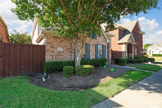 view of home's exterior with a yard