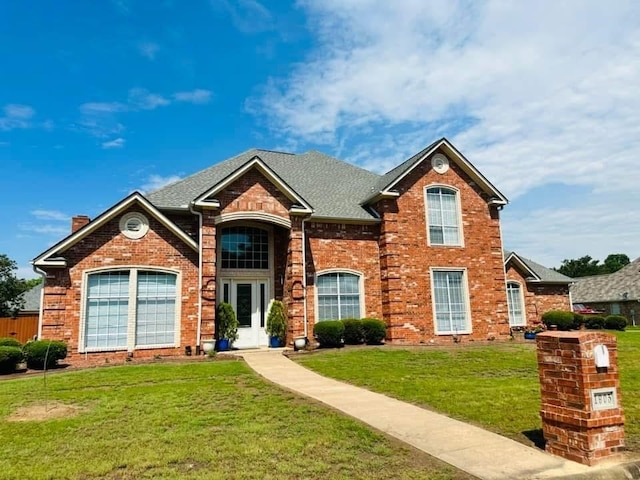 front of property with french doors and a front yard