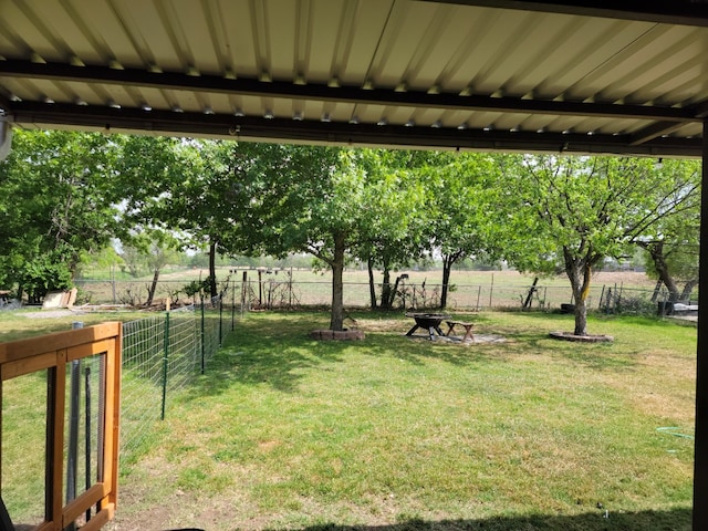 view of yard with a rural view