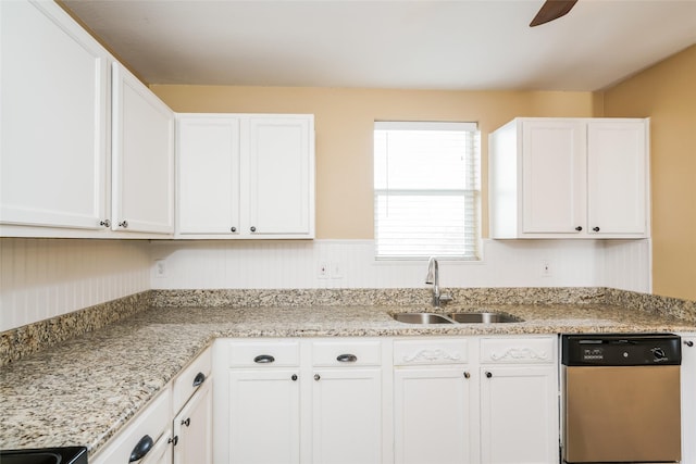 kitchen featuring white cabinets, sink, and dishwasher