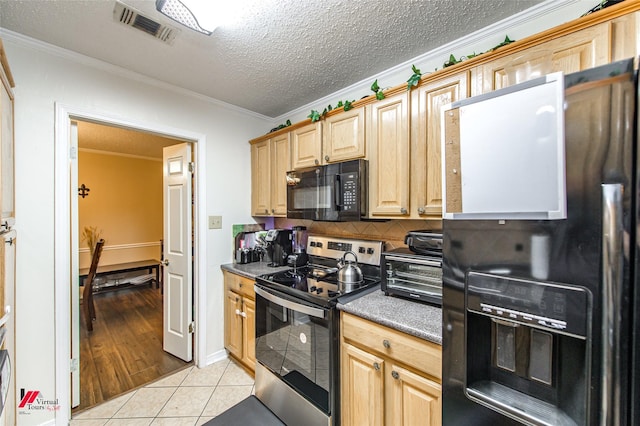 kitchen featuring tasteful backsplash, light tile patterned floors, ornamental molding, and black appliances