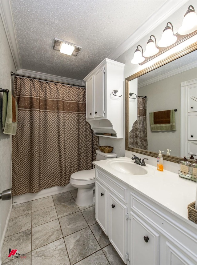 bathroom with crown molding, vanity, and a textured ceiling