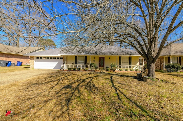 single story home featuring a garage, a front lawn, and a porch