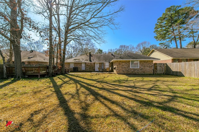 view of yard featuring a deck