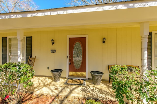 entrance to property with a porch