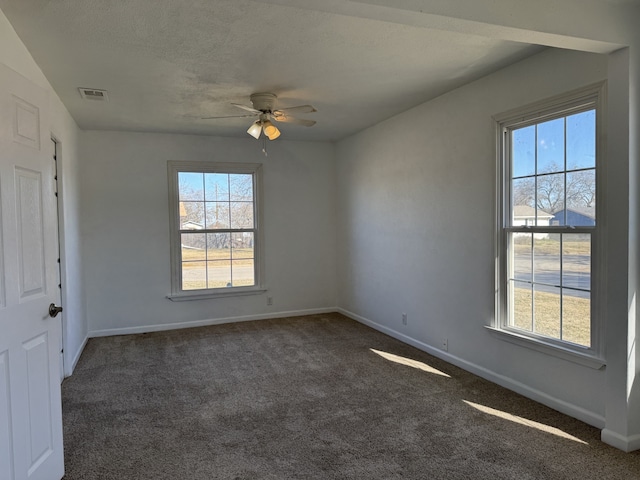 carpeted empty room with ceiling fan