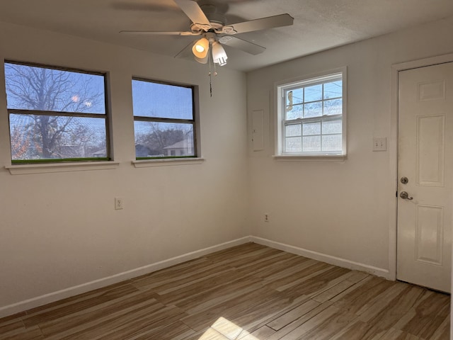 unfurnished room featuring wood-type flooring and ceiling fan