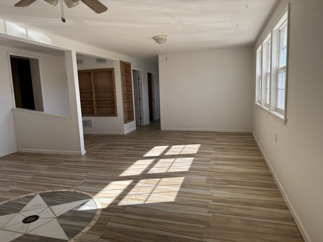 empty room with ceiling fan