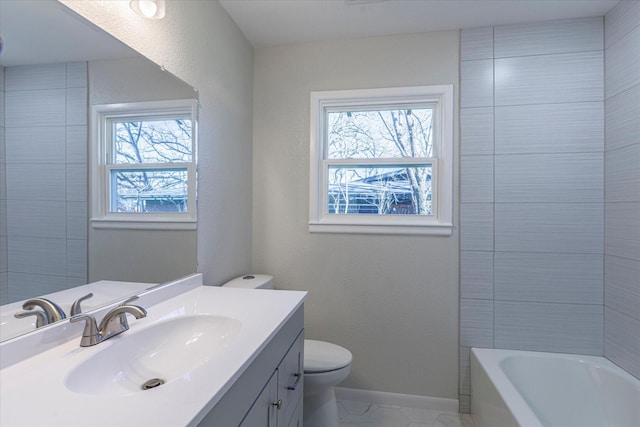 bathroom with vanity and toilet