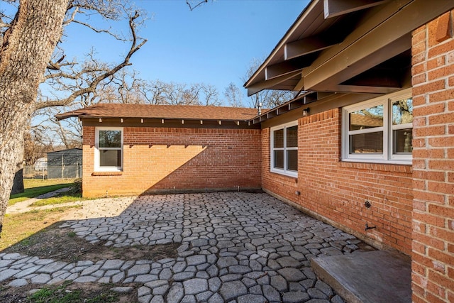 view of home's exterior featuring a patio area