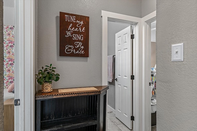 corridor featuring light tile patterned flooring