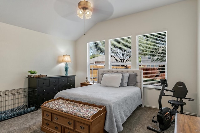 carpeted bedroom featuring vaulted ceiling and ceiling fan