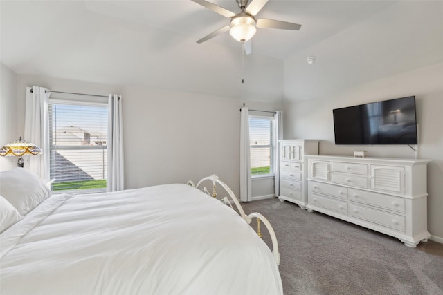 carpeted bedroom featuring ceiling fan and lofted ceiling