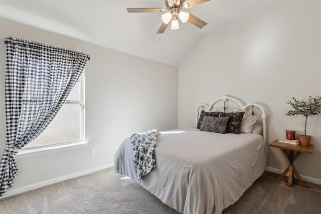 carpeted bedroom featuring ceiling fan and lofted ceiling