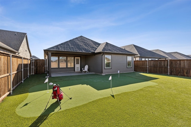 back of house with a patio