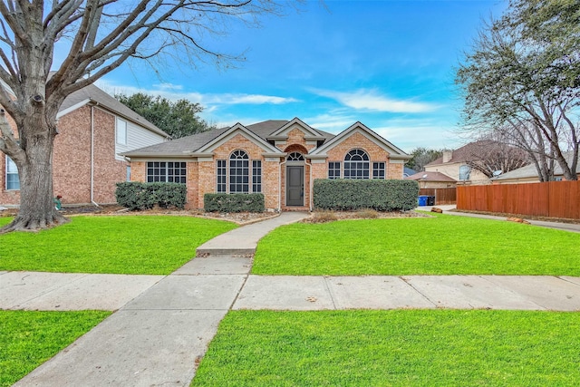 view of front of house with a front lawn