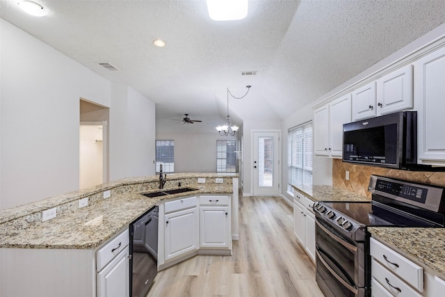 kitchen featuring white cabinetry, double oven range, sink, and dishwasher