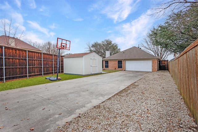 view of basketball court featuring a yard