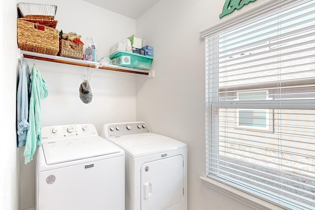 laundry area with washer and dryer