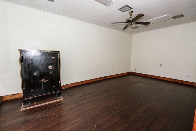 spare room with hardwood / wood-style floors and ceiling fan