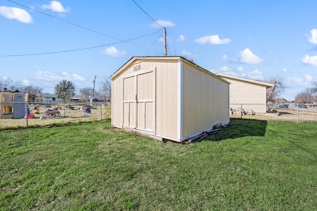 view of outdoor structure featuring a yard