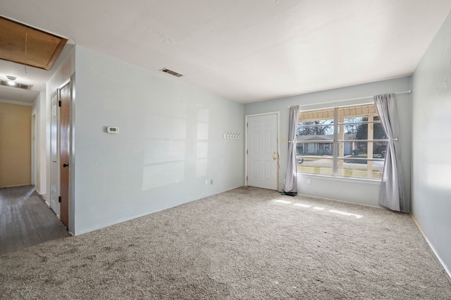 unfurnished room featuring carpet flooring