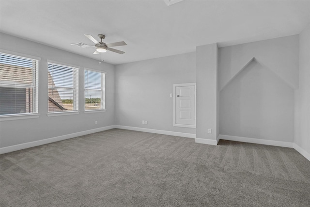 carpeted empty room with ceiling fan