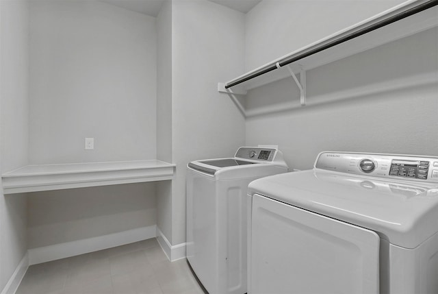 laundry room with washer and clothes dryer