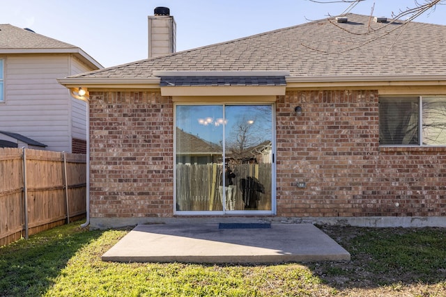 back of property featuring a patio area