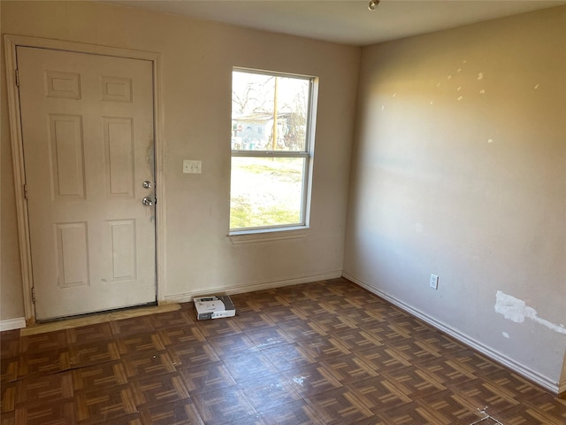 entrance foyer with dark parquet floors