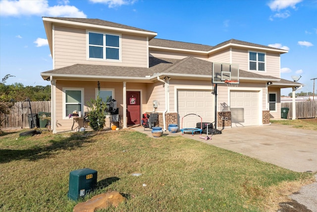 view of front of house with a garage and a front yard