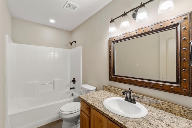 full bathroom featuring shower / tub combination, vanity, and toilet