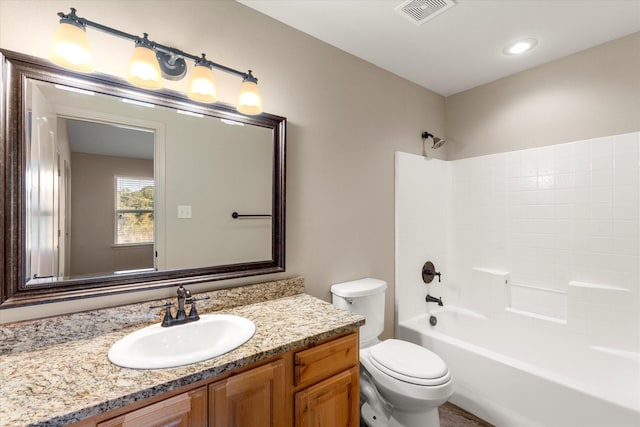 full bathroom featuring vanity, toilet, and shower / washtub combination