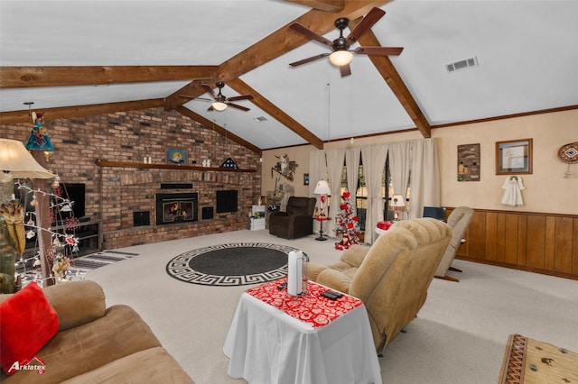 living room featuring lofted ceiling, light carpet, a brick fireplace, and wood walls