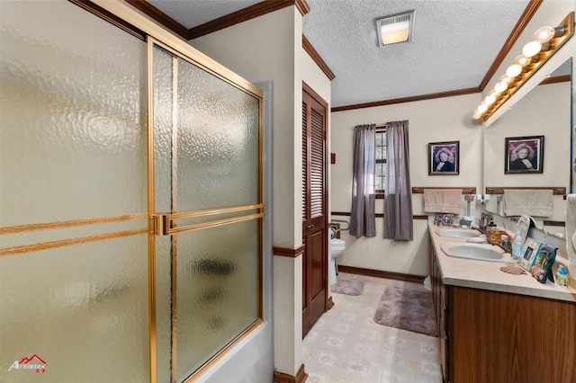 full bathroom featuring enclosed tub / shower combo, vanity, ornamental molding, a textured ceiling, and toilet