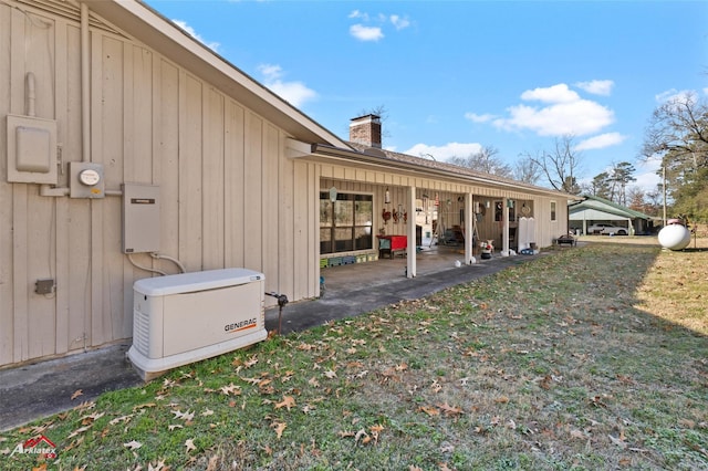 view of home's exterior featuring a lawn