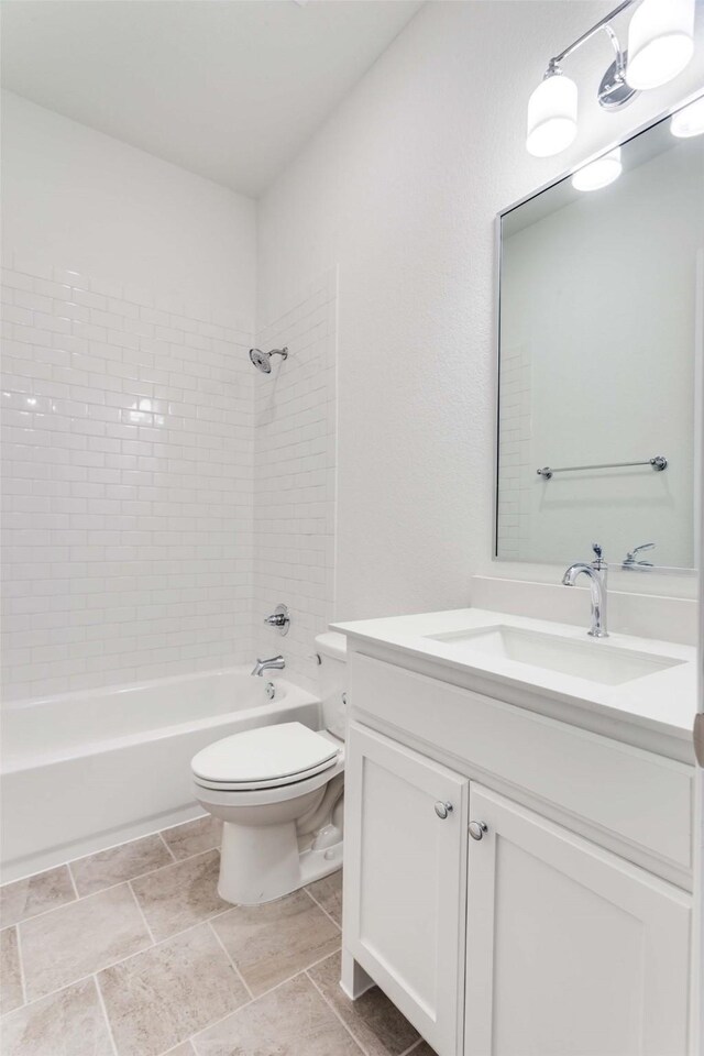 full bathroom with vanity, shower / bathing tub combination, and toilet