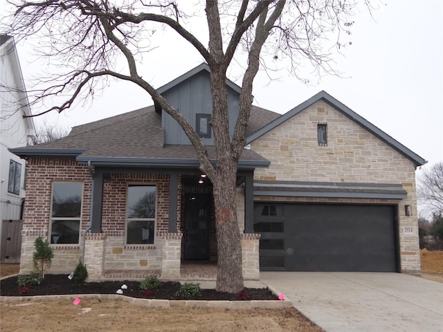 view of front of property with a garage