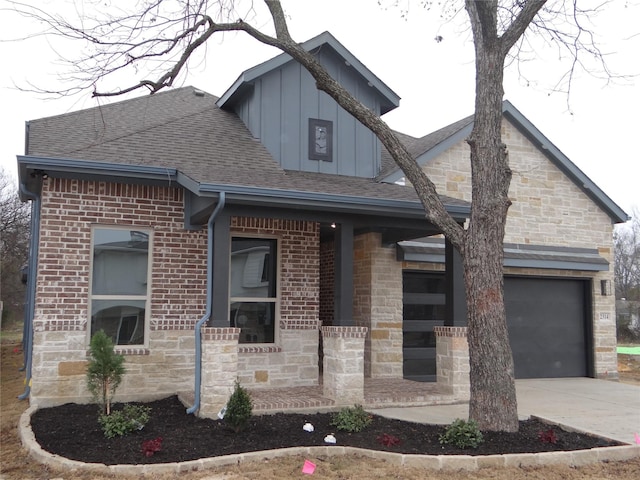 view of front of property with a garage