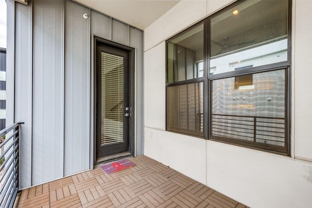 doorway to property featuring a balcony