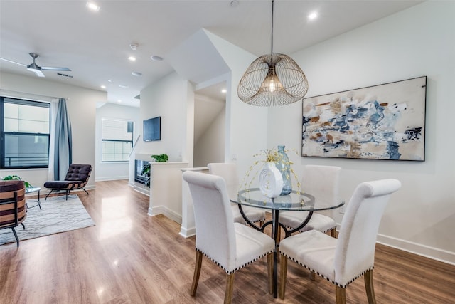 dining area with hardwood / wood-style floors