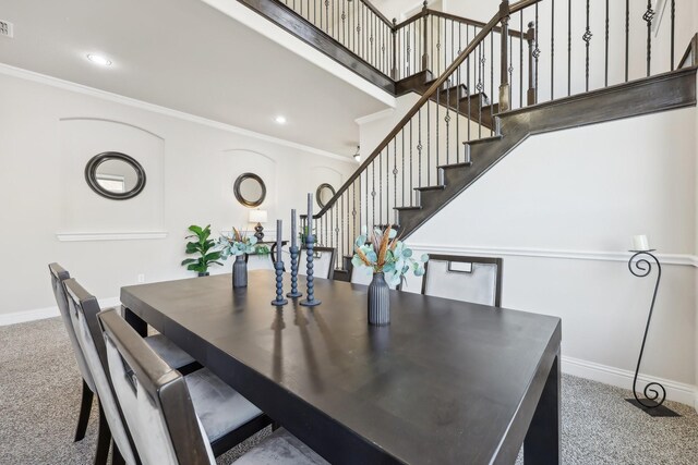 unfurnished dining area with lofted ceiling, crown molding, and plenty of natural light