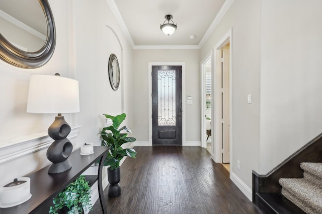 foyer entrance with crown molding, baseboards, and dark wood-style flooring