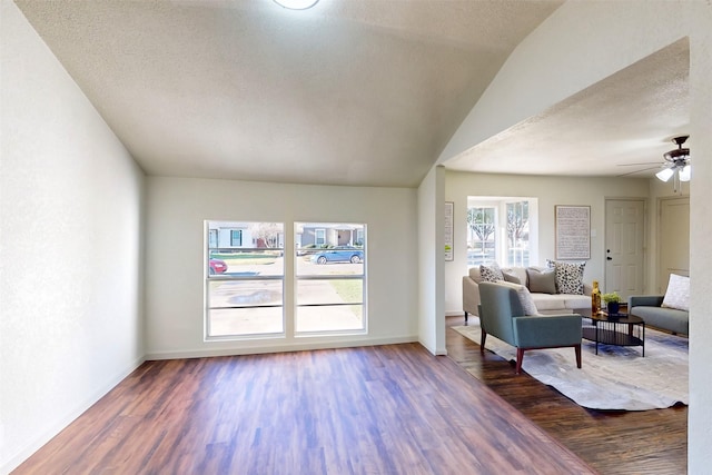2842 Carlson Dr, Dallas, TX 75235 - interior space with dark wood-type flooring, ceiling fan, and vaulted ceiling