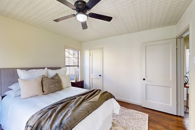 2842 Carlson Dr, Dallas, TX 75235 - bedroom featuring ceiling fan and dark hardwood / wood-style floors