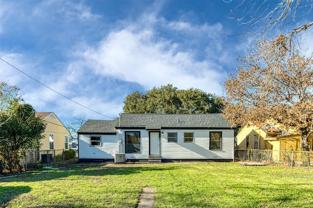 2842 Carlson Dr, Dallas, TX 75235 - view of front facade with central AC unit and a front lawn