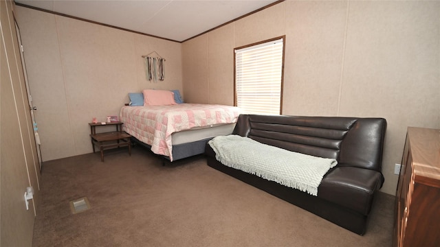 carpeted bedroom with ornamental molding