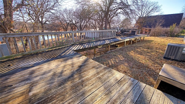 wooden deck with central AC unit